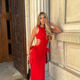 https://cdn.shopify.com/s/files/1/0293/9277/files/11-25-2024__456_Celine_Cut_Out_Bow_Maxi_Dress_Red_LA.jpg?v=1739412133