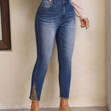 LUNE Jeans ajustados con estampado de leopardo bajo crudo