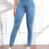 Jeans ajustados con bolsillo oblicuo