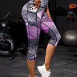 Yoga Future Leggings deportivos de color combinado de rayas & con bolsillo de celular