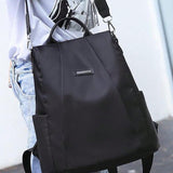 Mochila antirrobo pequena y sencilla para mujer, bolso de hombro bidireccional, mochila impermeable para la escuela y viajes