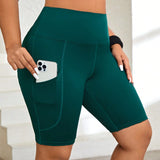 Yoga Basic Talla grande Shorts deportivos de cintura ancha con bolsillo para telefono