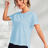 Yoga Trendy Camiseta deportiva con abertura trasera bajo asimetrico
