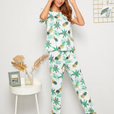 Conjunto de pijama con estampado tropical de pina con mascara de ojo