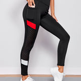 Yoga Futuristic Leggings deportivos de color combinado con bolsillo