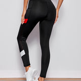 Yoga Futuristic Leggings deportivos de color combinado con bolsillo