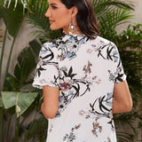 Top floral escote V de malla