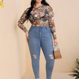 Top con estampado floral de malla