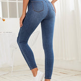 Essnce Jeans ajustados con diseno roto