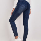 Frenchy Jeans ajustados de talle alto con diseno roto