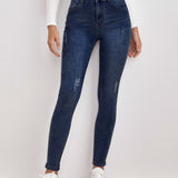 Frenchy Jeans ajustados de talle alto con diseno roto