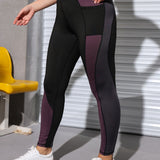 Yoga Basic Leggings deportivos con estiramiento alto de color combinado con bolsillo de celular