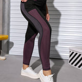 Yoga Basic Leggings deportivos con estiramiento alto de color combinado con bolsillo de celular