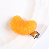 Pinza de pelo de cocodrilo mandarina con diseno