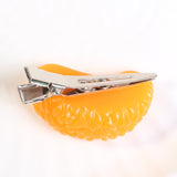 Pinza de pelo de cocodrilo mandarina con diseno