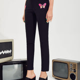 ICON Pantalones con estampado de mariposa con abertura