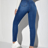 Essnce Jeans ajustados con diseno de desgarro