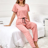 Conjunto de pijama pantalones con camiConjuntoa con estampado de lunares ribete en forma de lechuga