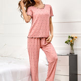 Conjunto de pijama pantalones con camiConjuntoa con estampado de lunares ribete en forma de lechuga