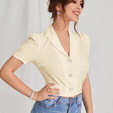 MOD Blusa de cuello con solapa de manga farol con boton