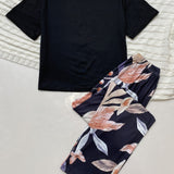 Conjunto de pijama top con estampado botanico con letra con pantalones