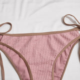 Braga bikini con cordon lateral unida en contraste