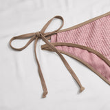 Braga bikini con cordon lateral unida en contraste