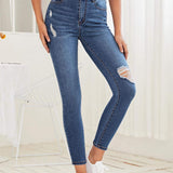 Essnce Jeans ajustados con diseno roto
