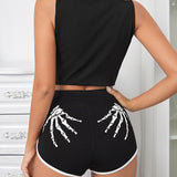 SXY Shorts estampado de esqueleto unido en contraste