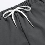 Mulvari Pantalones zanahoria de cintura con cordon con letra con bordado