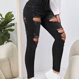 Essnce Jeans ajustados rotos