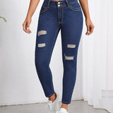 Unity Jeans ajustados desgarro