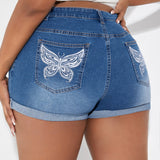 SXY Shorts en mezclilla con estampado de mariposa bajo de doblez