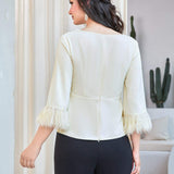 Blusa ribete con fleco unicolor