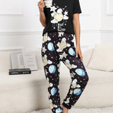 Conjunto de pijama pantalones con camiConjuntoa con estampado de luna y slogan