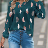 Blusa con estampado de pluma de cuello de muesca de manga obispo