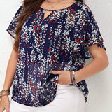 Blusa con estampado floral de cuello con abertura de ojo de manga mariposa