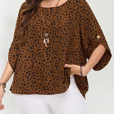 Blusa con estampado de lunares