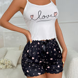 Conjunto de pijama con estampado de corazon y letra ribete en forma de lechuga