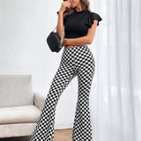 Prive Pantalones acampanados con estampado de cuadros