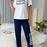 Conjunto de pijama pantalones con camiConjuntoa con estampado de slogan