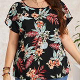 Blusa con estampado tropical de manga murcielago