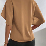 Blusa unicolor manga tulipan de cuello V