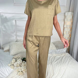 Conjunto de pijama pantalones con camiseta unicolor con parche con bolsillo