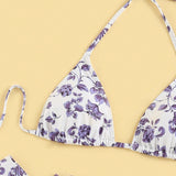 Bañador bikini triángulo halter con estampado floral con falda de playa