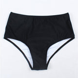 Bikini minimalista negro de cintura alta y triangulo para playa en verano