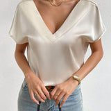 Blusa unicolor de cuello V de Satin