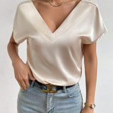 Blusa unicolor de cuello V de Satin