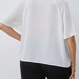 Blusa de manga raglan de cuello con cordon