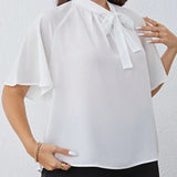 Blusa de manga raglan de cuello con cordon